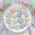 Birthday cookie platter with 12 pastel cookies