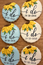 Sunflower I do wedding cookies on a wooden table